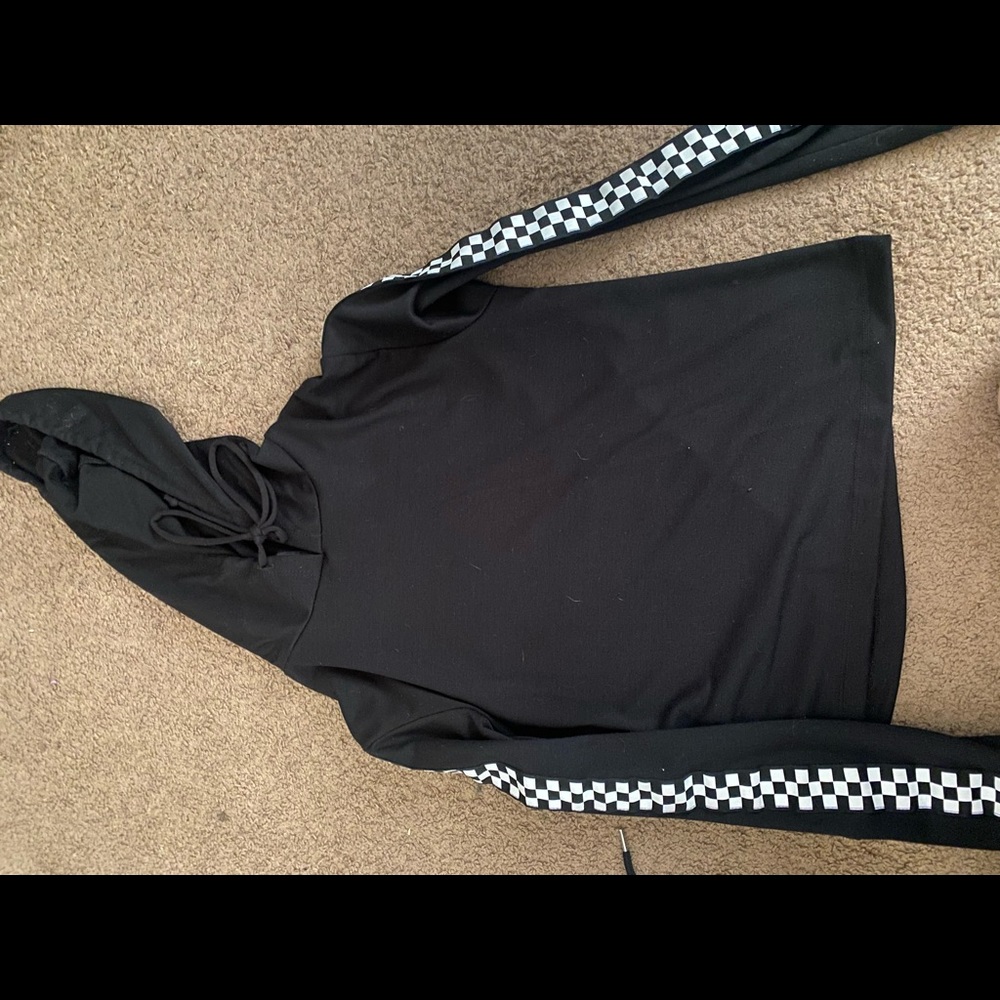 Thin, black hoodie with checkered stripes on sleeves